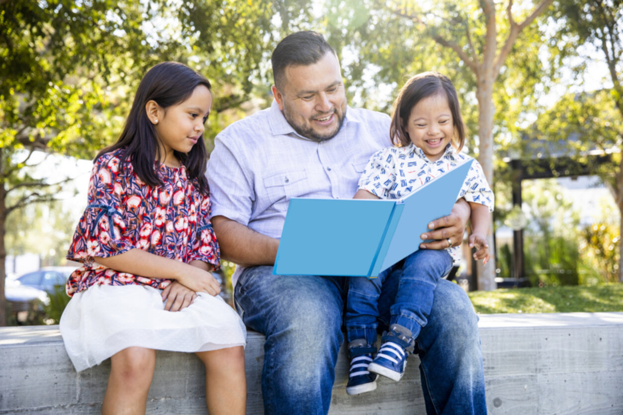 Factors Inhibiting Hispanic Parents’ Involvement at School Elementary Age Schoolgirl Reading Book In Class With Teacher